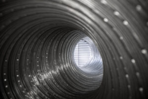 Duct Sealing for Winter. Inside flexible aluminum ventilation tube.